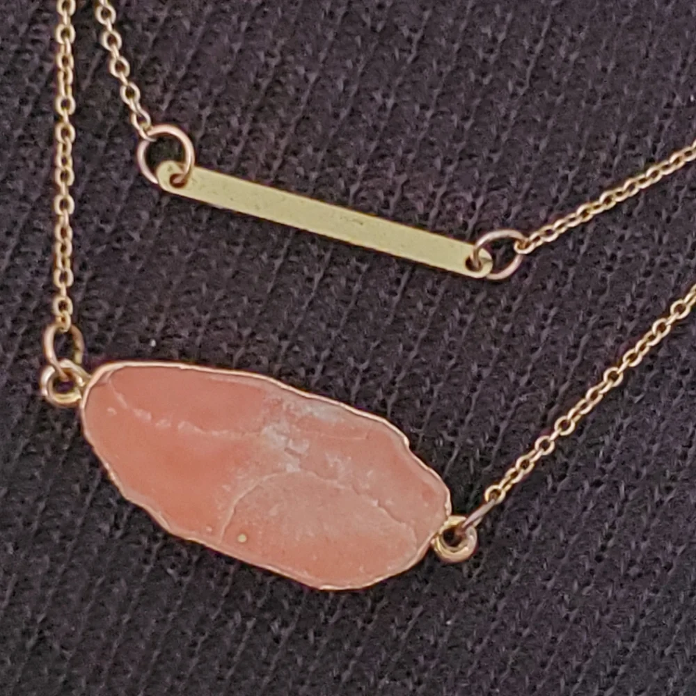 Copper tone two strand necklace with salmon colored marble look stone